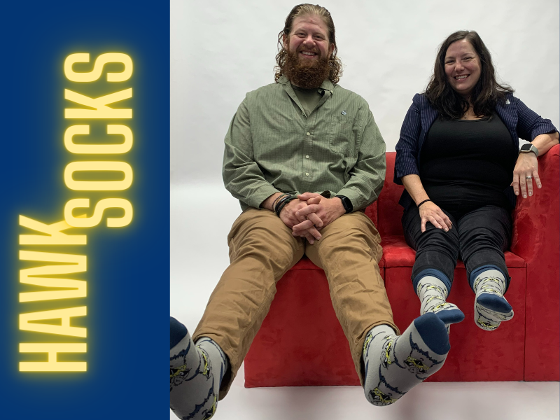 Hawk Socks with two people wearing hawk socks