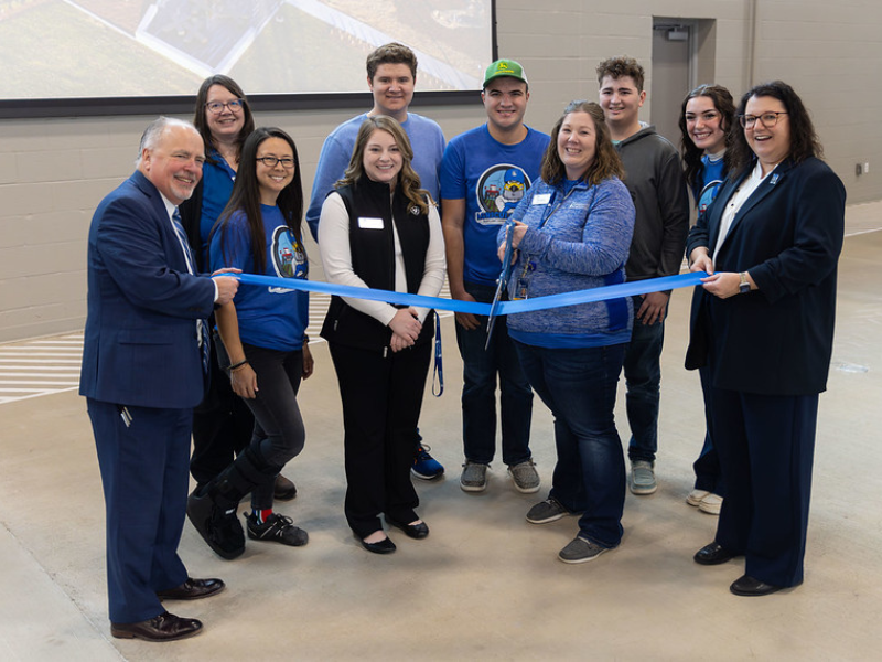 Picture of ag faculty cutting the ribbon on their new building