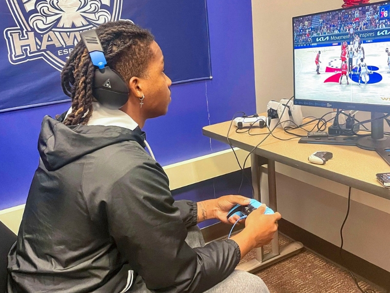 Picture of Jono playing NBA 2K