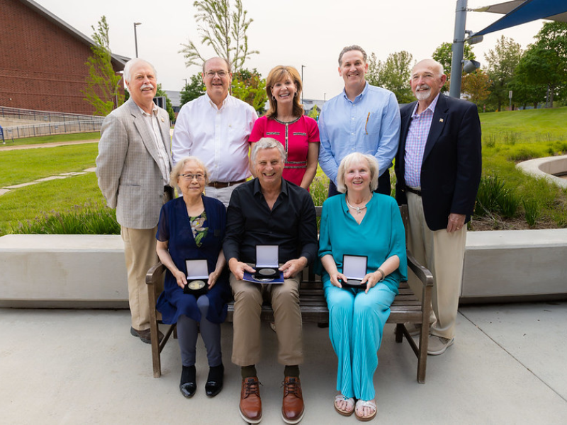 A photo of the group of people who were presented with a President's Medallion