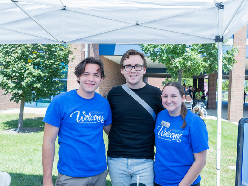 A picture of three people on the Quad