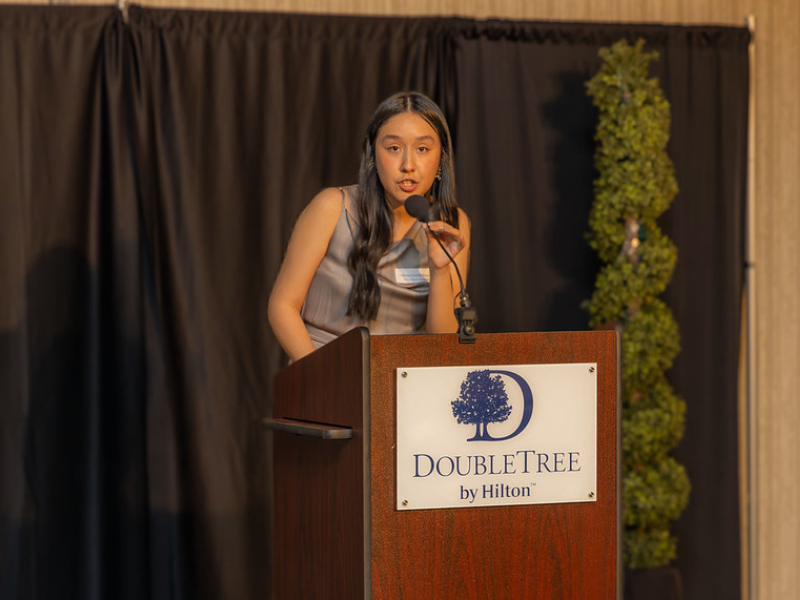 A photo of student speaker Lindsey Coronel Rosales at a podium