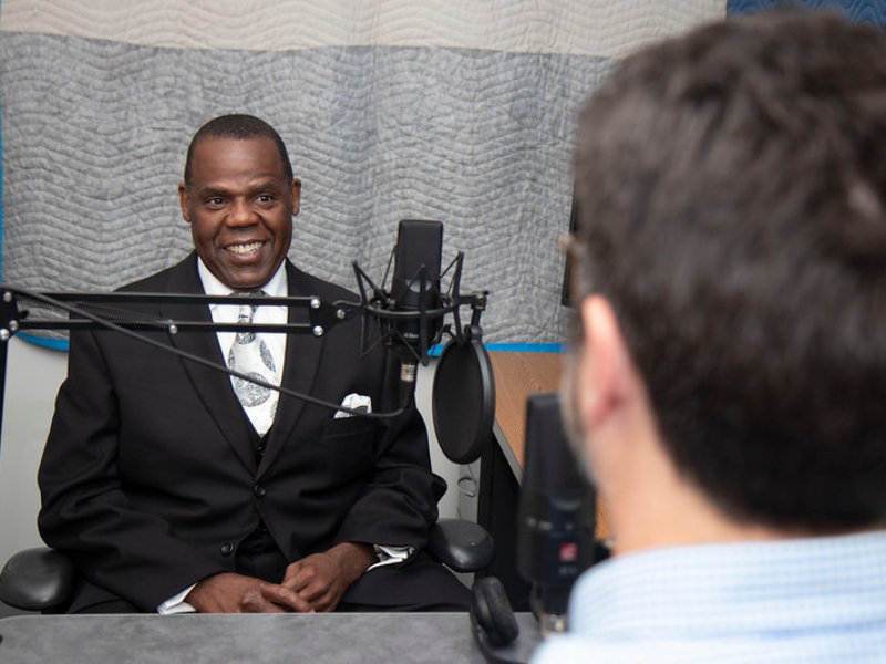 A photo of Dewhitt Bingham being interviewed on a podcast