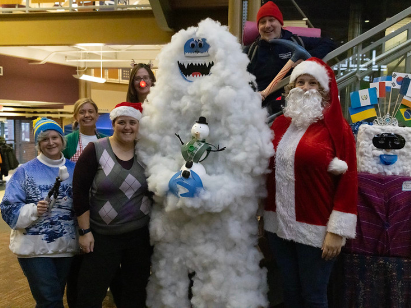 A photo of a group of people dressed as characters from Rudolph the Red Nosed Reindeer