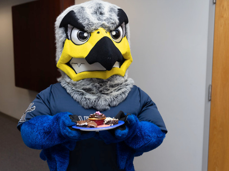 A picture of Hunter holding some baked goods