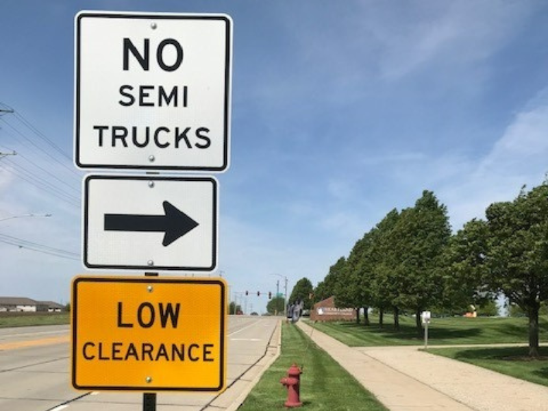 Photo of low clearance street signs